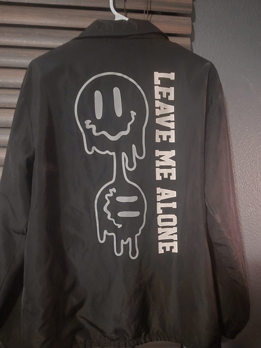 Eighty Eight Black Coach Jacket with White Dripping Smiley Graphic